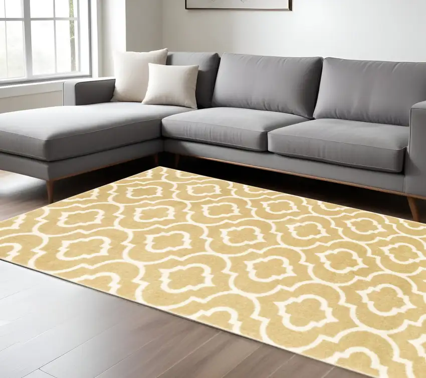 Gold And Ivory Geometric Power Loom Stain Resistant Area Rug Photo 1