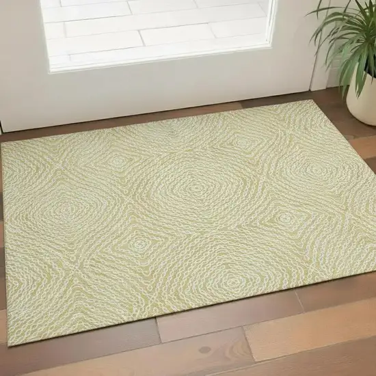Gold And Ivory Geometric Washable Area Rug With UV Protection Photo 1