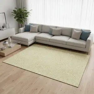 Photo of Gold And Ivory Geometric Washable Area Rug With UV Protection