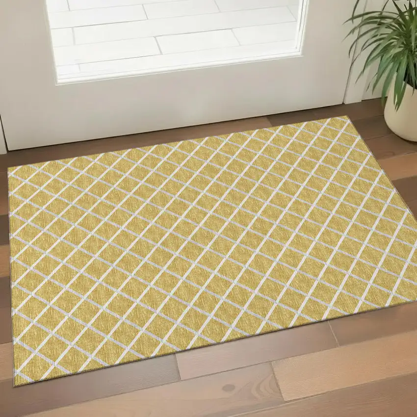 Gold And Ivory Geometric Washable Area Rug With UV Protection Photo 1