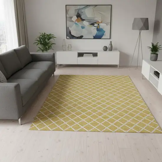 Gold And Ivory Geometric Washable Area Rug With UV Protection Photo 1