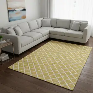 Photo of Gold And Ivory Geometric Washable Area Rug With UV Protection
