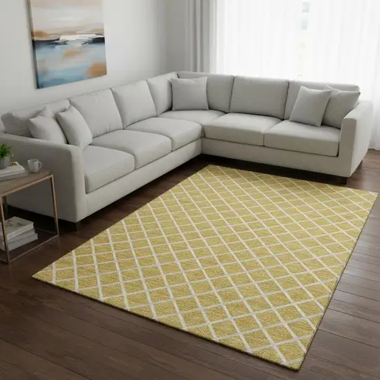 Gold And Ivory Geometric Washable Area Rug With UV Protection Photo 1