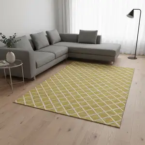 Photo of Gold And Ivory Geometric Washable Area Rug With UV Protection