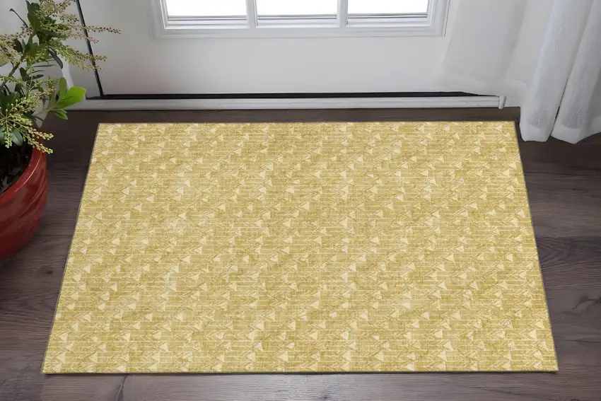 Gold And Ivory Geometric Washable Area Rug With UV Protection Photo 2