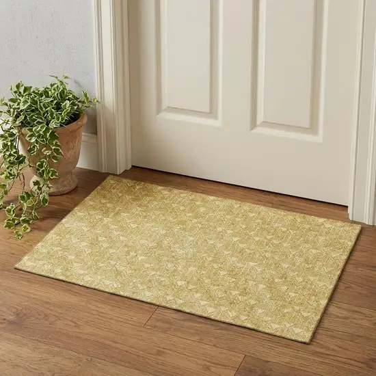 Gold And Ivory Geometric Washable Area Rug With UV Protection Photo 1