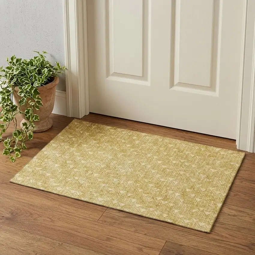 Gold And Ivory Geometric Washable Area Rug With UV Protection Photo 1