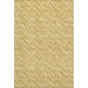 Photo of Gold And Ivory Geometric Washable Area Rug With UV Protection