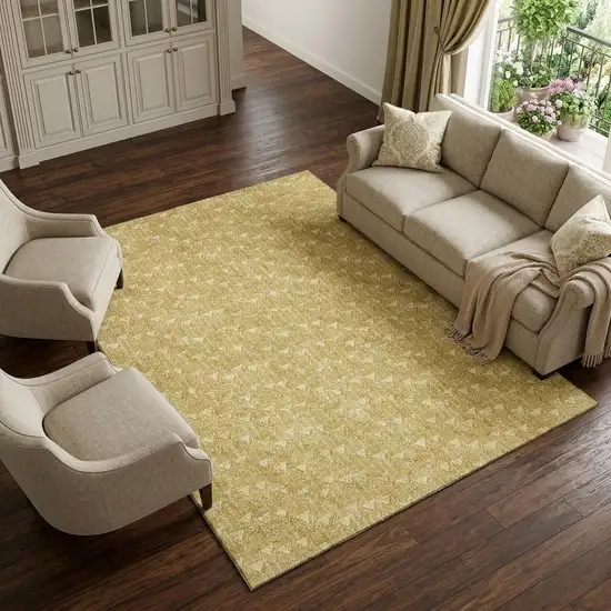 Gold And Ivory Geometric Washable Area Rug With UV Protection Photo 1