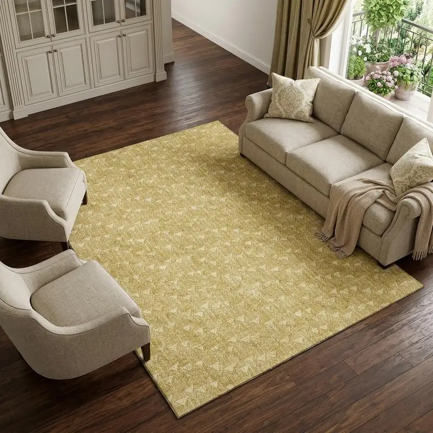 Gold And Ivory Geometric Washable Area Rug With UV Protection Photo 1