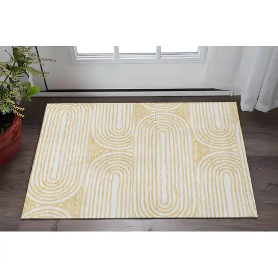 Gold And Ivory Geometric Washable Area Rug With UV Protection Photo 2