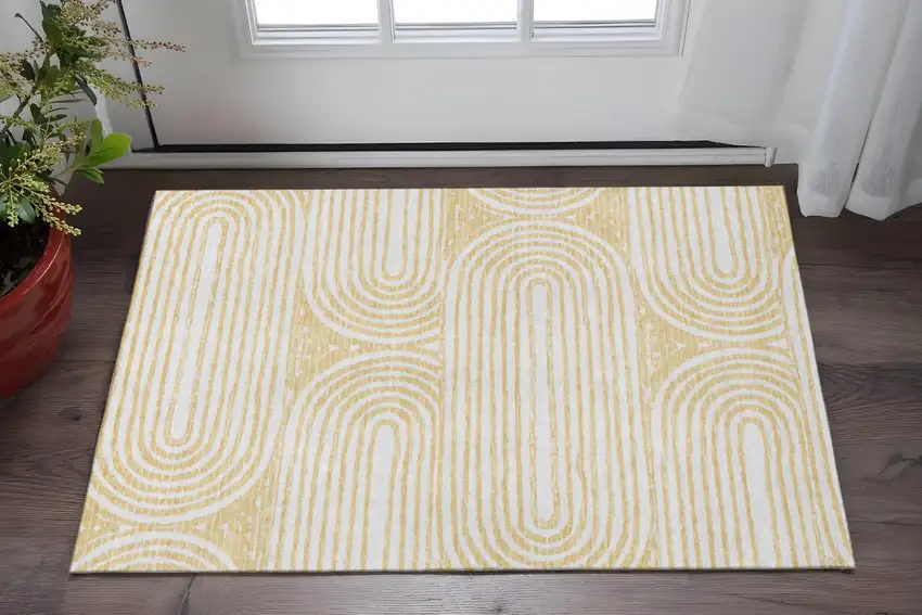 Gold And Ivory Geometric Washable Area Rug With UV Protection Photo 2