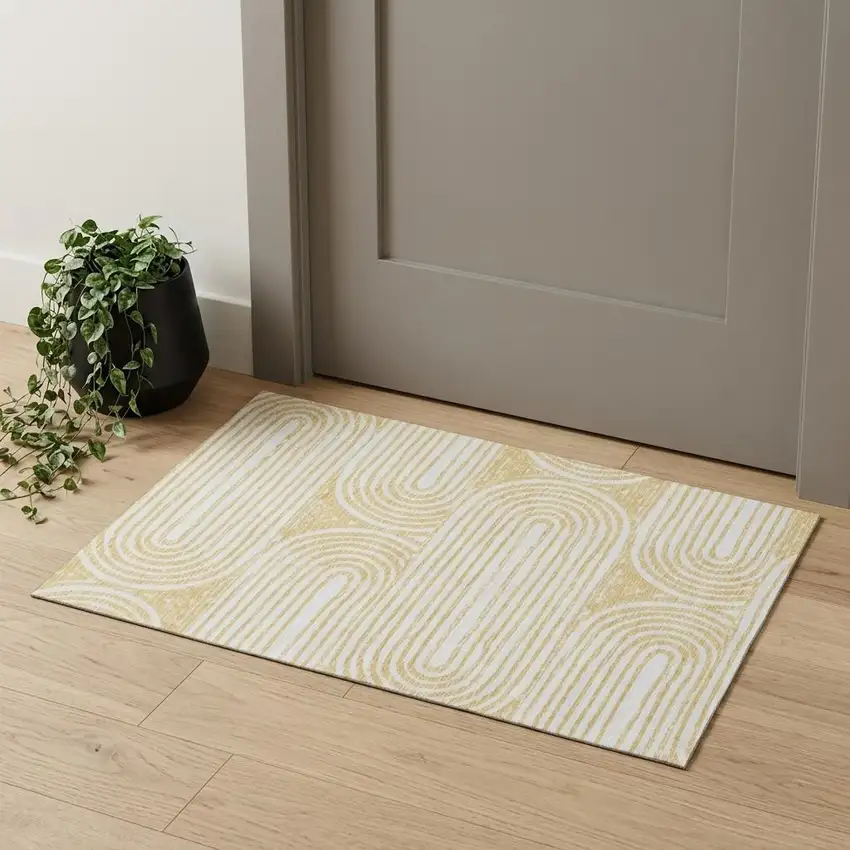 Gold And Ivory Geometric Distressed Washable Area Rug With UV Protection Photo 1