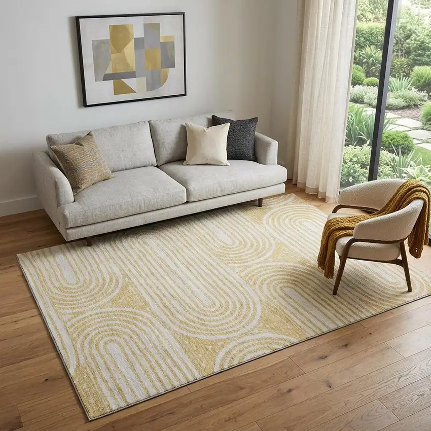 Gold And Ivory Geometric Distressed Washable Area Rug With UV Protection Photo 1