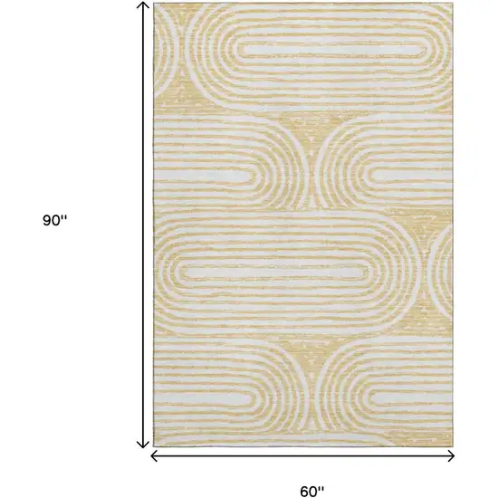 Gold And Ivory Geometric Distressed Washable Area Rug With UV Protection Photo 8