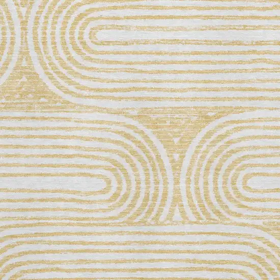 Gold And Ivory Geometric Distressed Washable Area Rug With UV Protection Photo 3