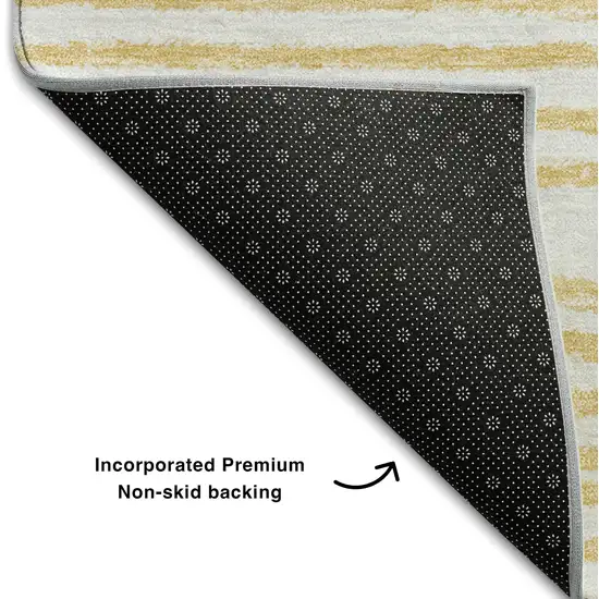 Gold And Ivory Geometric Distressed Washable Area Rug With UV Protection Photo 7