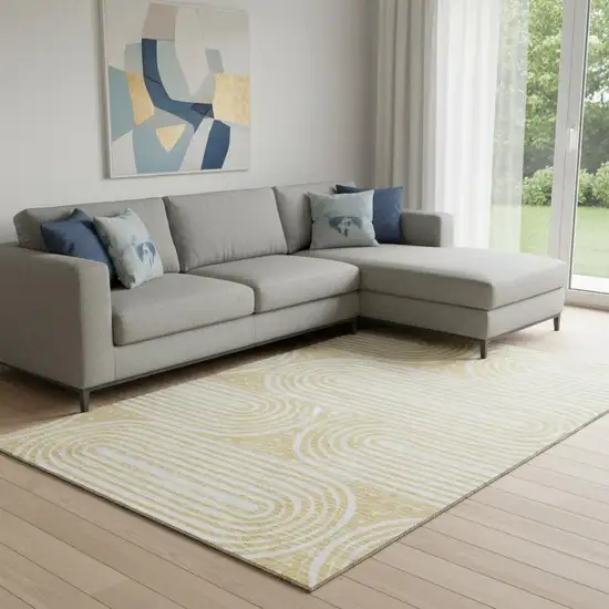 Gold And Ivory Geometric Washable Area Rug With UV Protection Photo 1