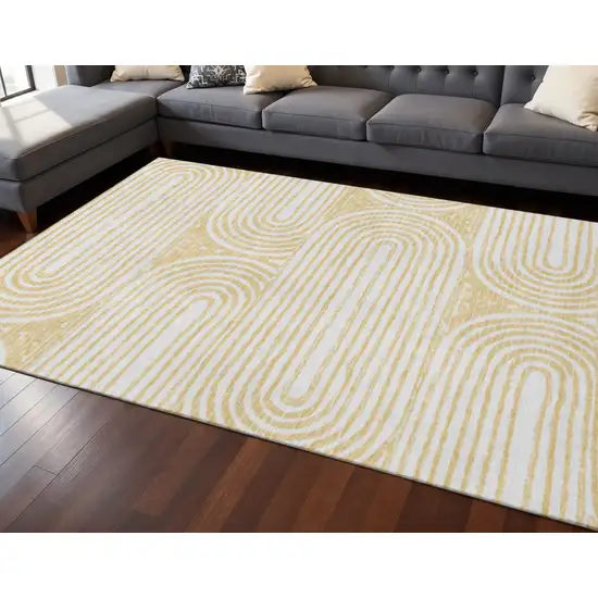 Gold And Ivory Geometric Washable Area Rug With UV Protection Photo 2