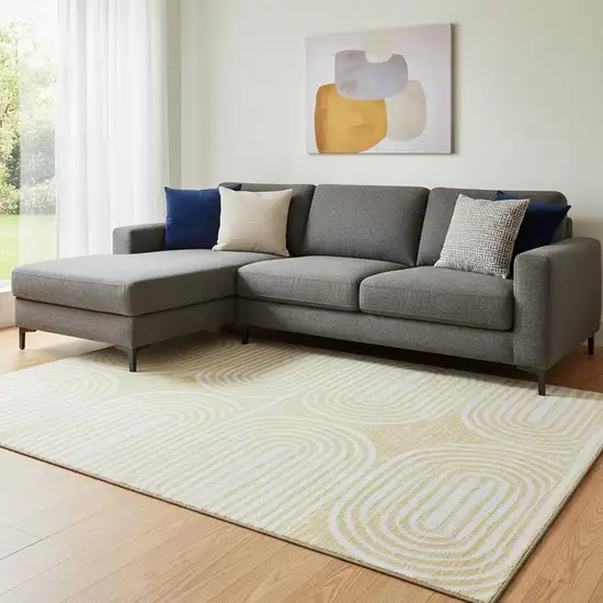 Gold And Ivory Geometric Washable Area Rug With UV Protection Photo 1