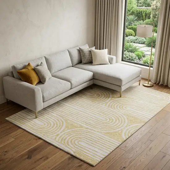 Gold And Ivory Geometric Distressed Washable Area Rug With UV Protection Photo 1