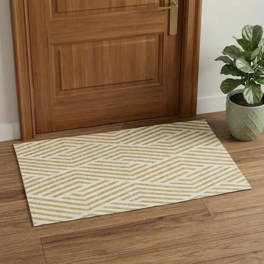 Gold And Ivory Geometric Washable Area Rug With UV Protection Photo 1