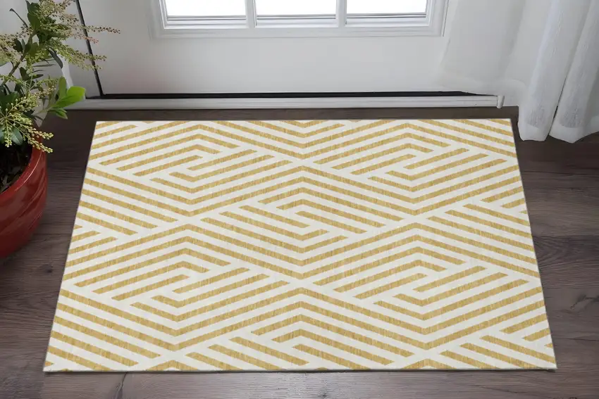 Gold And Ivory Geometric Washable Area Rug With UV Protection Photo 2