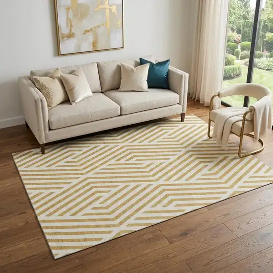 Gold And Ivory Geometric Washable Area Rug With UV Protection Photo 1