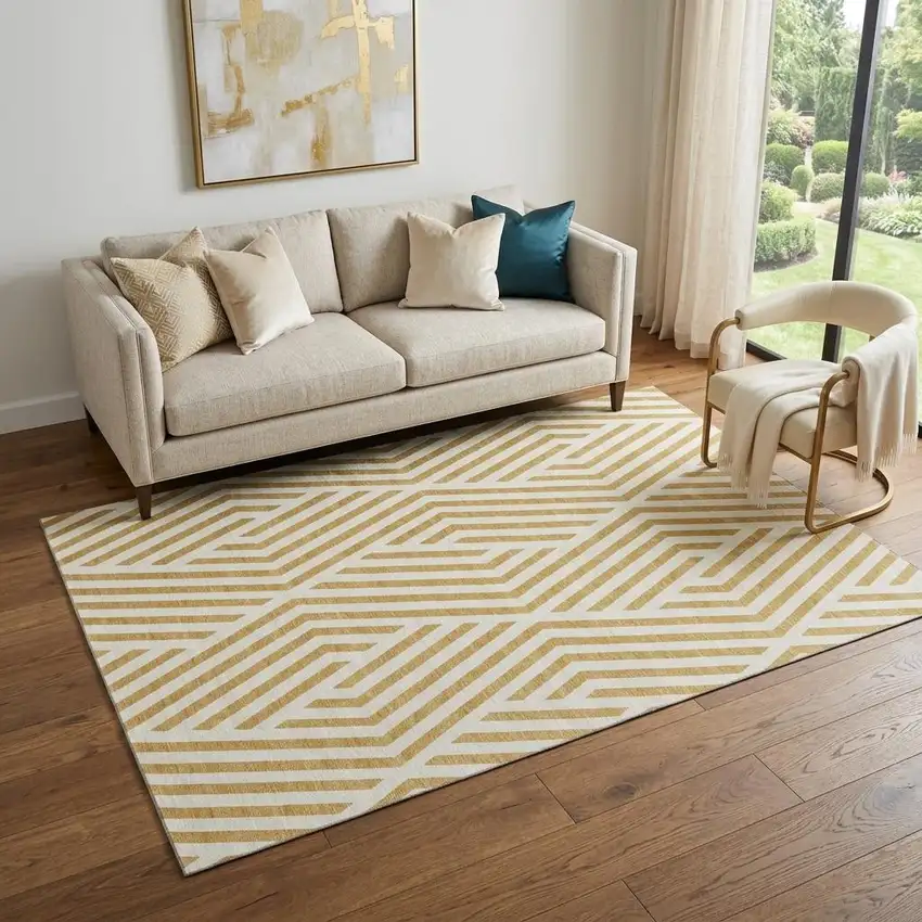 Gold And Ivory Geometric Washable Area Rug With UV Protection Photo 1