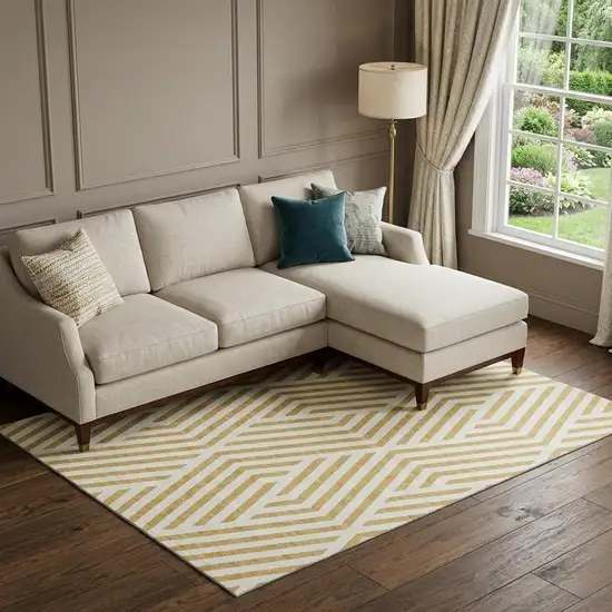 Gold And Ivory Geometric Washable Area Rug With UV Protection Photo 1