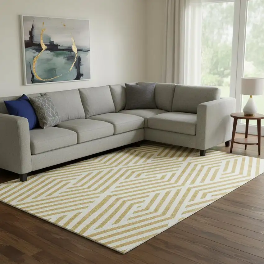 Gold And Ivory Geometric Washable Area Rug With UV Protection Photo 1