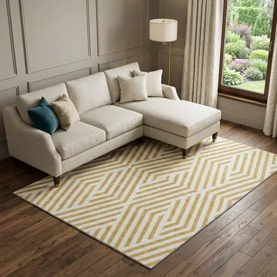 Gold And Ivory Geometric Washable Area Rug With UV Protection Photo 1