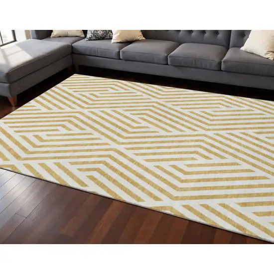 Gold And Ivory Geometric Washable Area Rug With UV Protection Photo 2