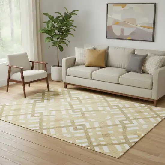 Gold And Ivory Geometric Washable Area Rug With UV Protection Photo 1