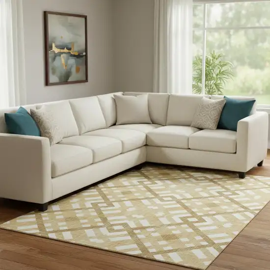 Gold And Ivory Geometric Washable Area Rug With UV Protection Photo 1