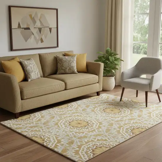 Gold And Ivory Geometric Washable Area Rug With UV Protection Photo 1