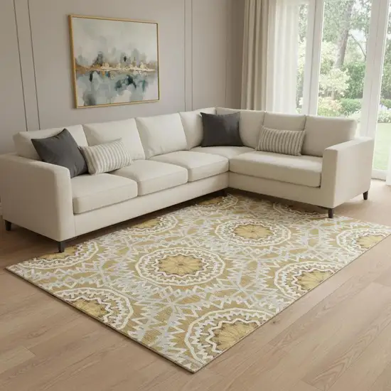 Gold And Ivory Geometric Washable Area Rug With UV Protection Photo 1