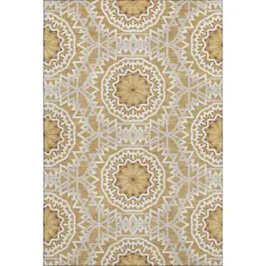 Photo of Gold And Ivory Geometric Washable Area Rug With UV Protection