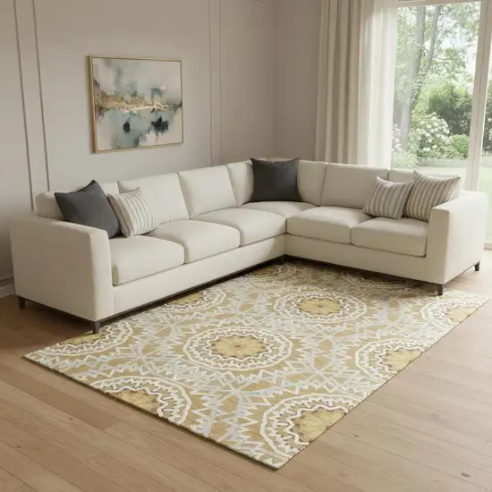 Gold And Ivory Geometric Washable Area Rug With UV Protection Photo 1