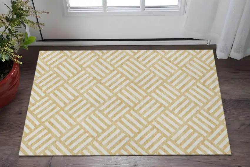 Gold And Ivory Geometric Washable Area Rug With UV Protection Photo 2