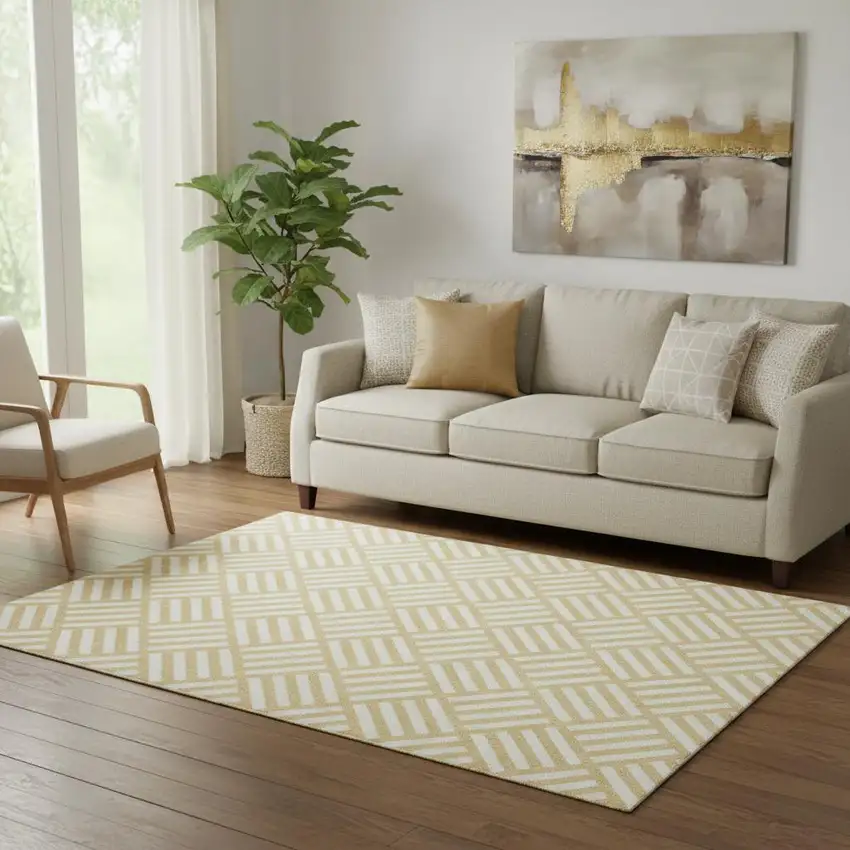 Gold And Ivory Geometric Washable Area Rug With UV Protection Photo 1