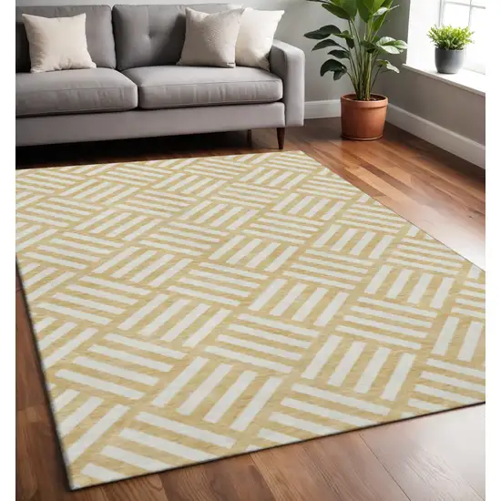 Gold And Ivory Geometric Washable Area Rug With UV Protection Photo 2