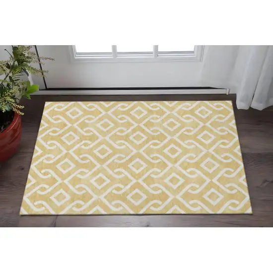 Gold And Ivory Geometric Washable Area Rug With UV Protection Photo 2