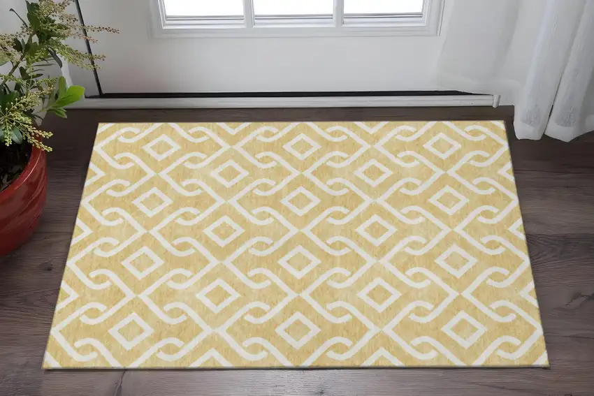 Gold And Ivory Geometric Washable Area Rug With UV Protection Photo 2