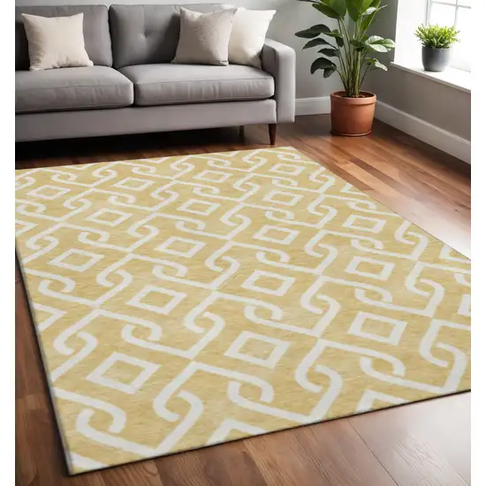 Gold And Ivory Geometric Washable Area Rug With UV Protection Photo 2