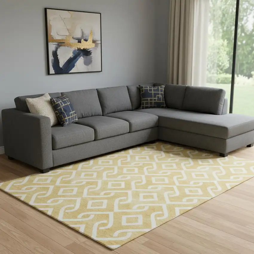 Gold And Ivory Geometric Washable Area Rug With UV Protection Photo 1
