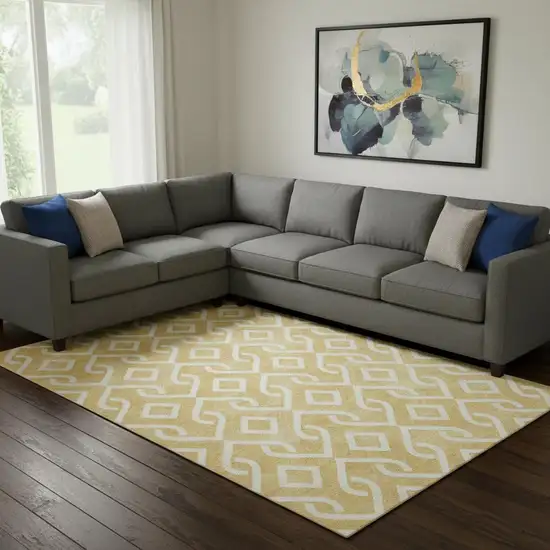 Gold And Ivory Geometric Washable Area Rug With UV Protection Photo 1