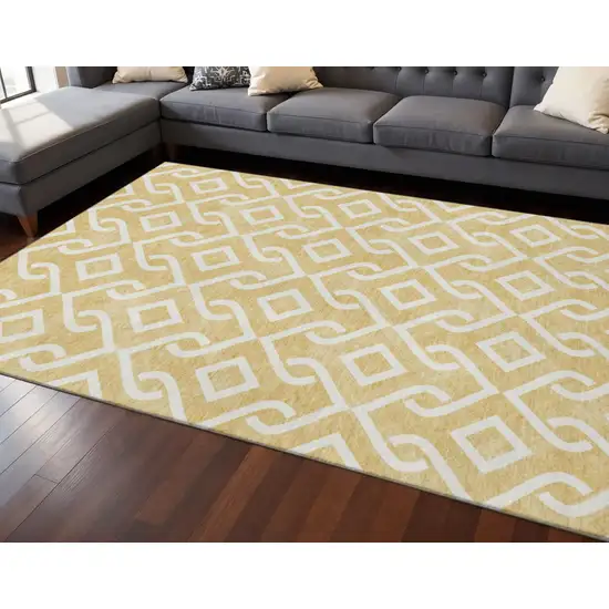 Gold And Ivory Geometric Washable Area Rug With UV Protection Photo 2