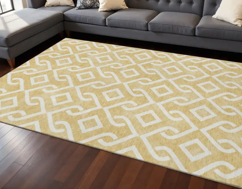 Gold And Ivory Geometric Washable Area Rug With UV Protection Photo 2