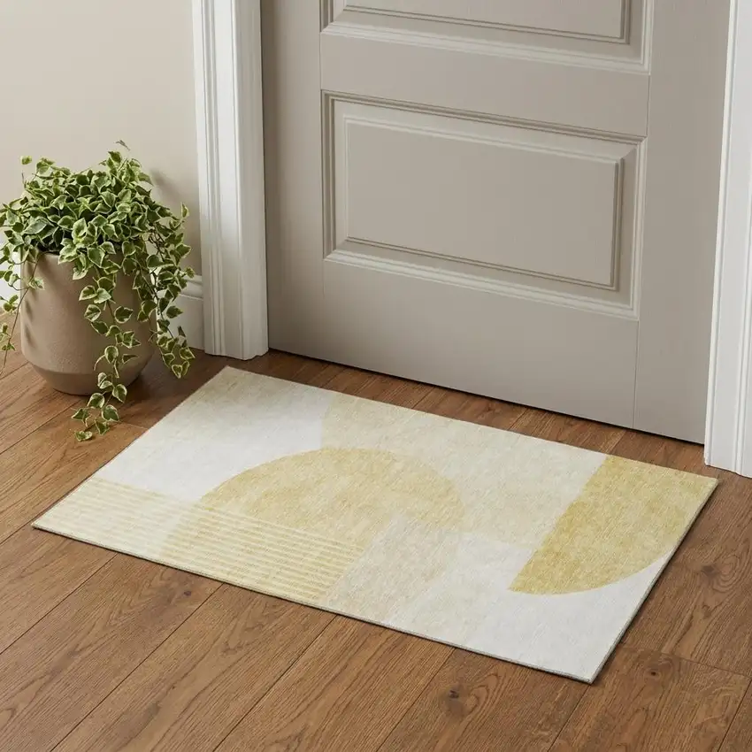 Gold And Ivory Geometric Washable Area Rug With UV Protection Photo 1